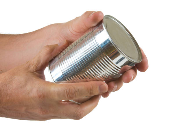 istock Food can in hand 898294702