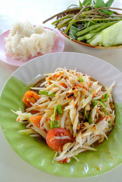 istock Thai papaya salad with sticky rice 898295062