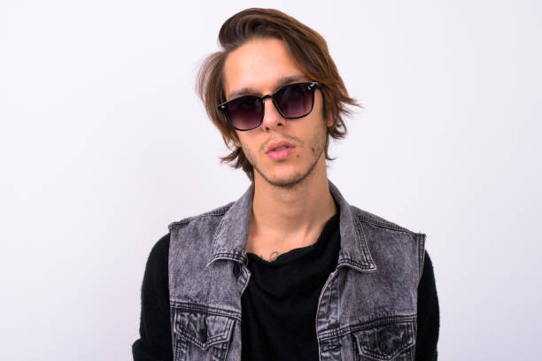 istock Studio shot of rebellious young man against white background 898298374