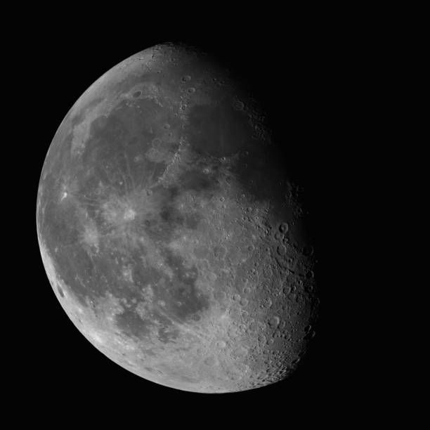 istock Waning Gibbous Moon isolated on black background 898306032