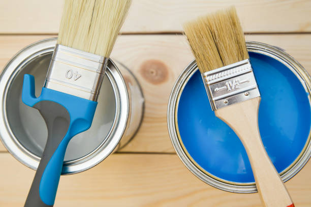 istock Cans of household paint and brushes 898306182