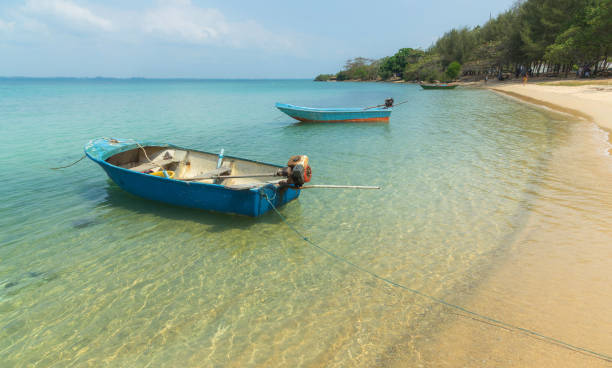 Clear view at beach with fisher boat