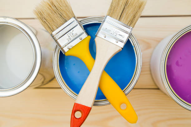 istock Cans of household paint and brushes 898306342