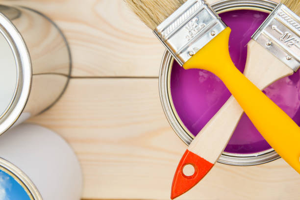 istock Cans of household paint and brushes 898306470