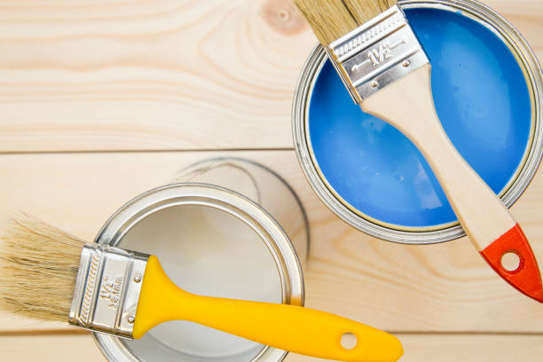istock Cans of household paint and brushes 898306534