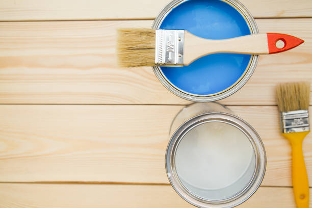 istock Cans of household paint and brushes 898306738