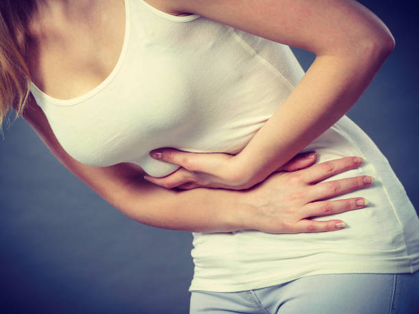 istock Woman suffer from belly pain. 898309446