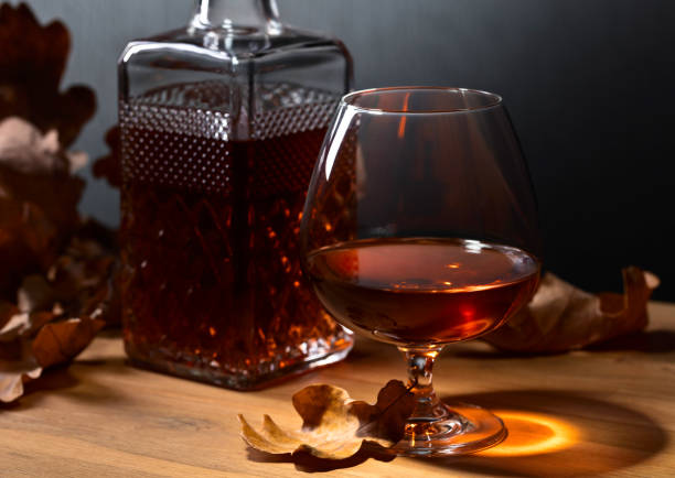 istock Brandy and dried up oak leaves . 898309632