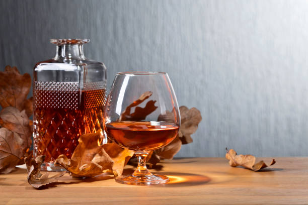 istock Brandy and dried up oak leaves . 898309648