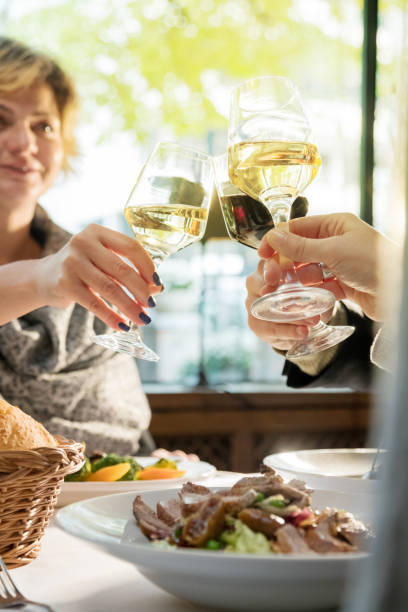 istock Celebratory toast in fine dinning restaurant 898310754