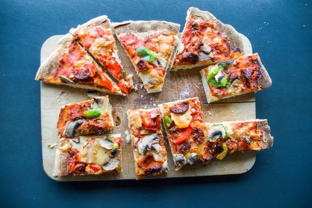 istock Slices of Pizza on cutting board 898313404