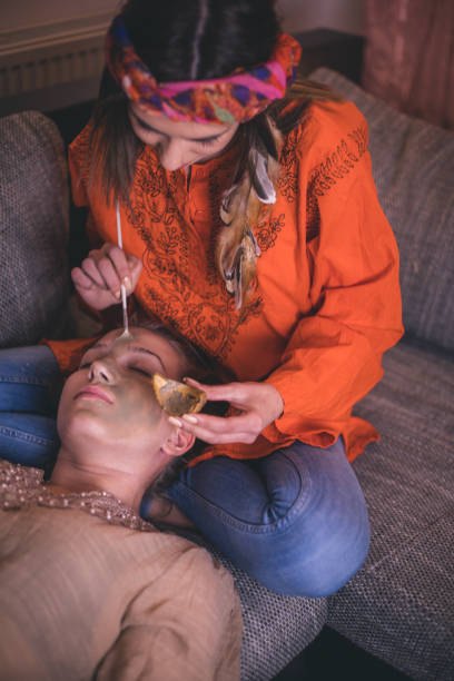istock Woman having facial mask 898313426