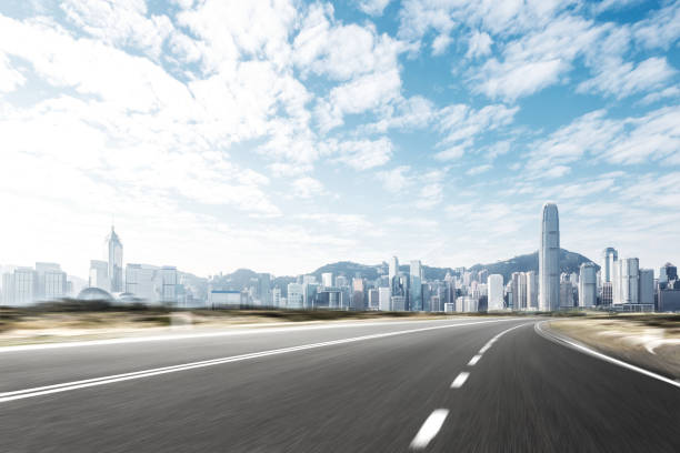 istock empty asphalt road with cityscape of modern city 898314536