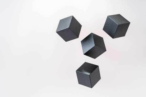 istock Black wooden cube shapes are floating. Concept of creative, logical thinking. Abstract geometric real floating wooden cube. 898315210
