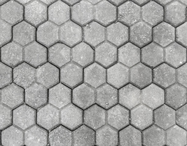 pietra da pavimentazione esagonale strutturata - sidewalk concrete textured textured effect foto e immagini stock