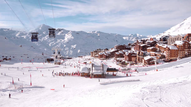 istock Buildings On Snowcapped Mountains Against Sky 898334318