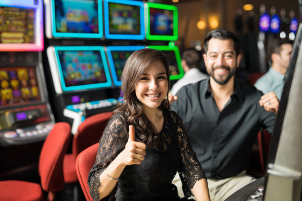 istock Cute couple winning in a casino 898339436
