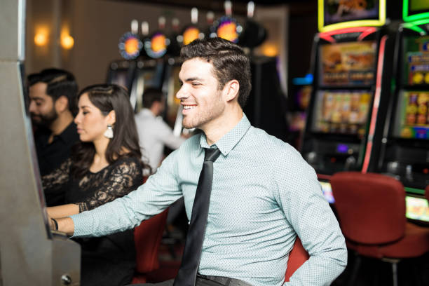 istock Man having fun in a casino 898340954