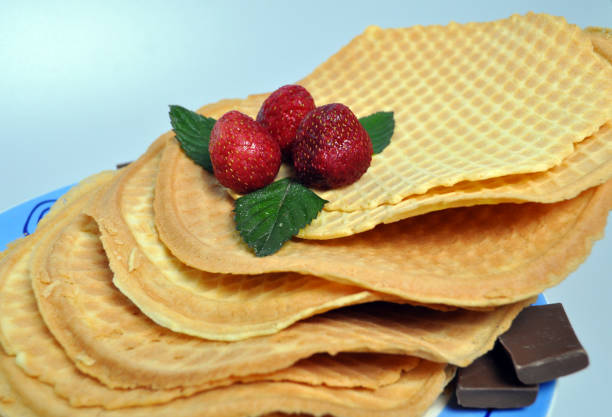 istock delicate, sweet dessert - crispy wafers with fruit 898341220