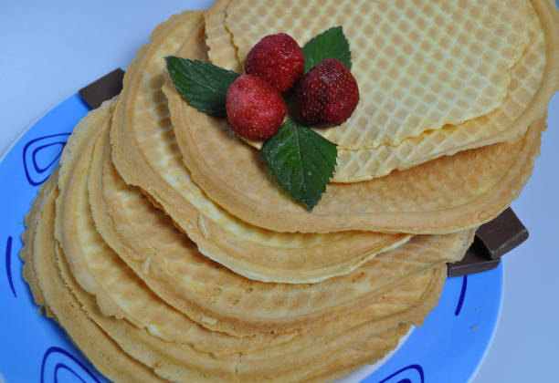istock delicate, sweet dessert - crispy wafers with fruit 898341222
