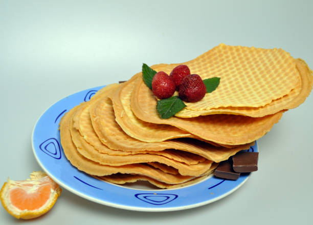 istock delicate, sweet dessert - crispy wafers with fruit 898341224