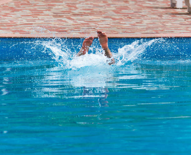 istock The man is swimming in the pool 898341254