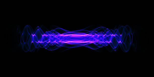 Plasma or high energy force concept. Blue-purple glowing energy waves isolated over black background. stock photo