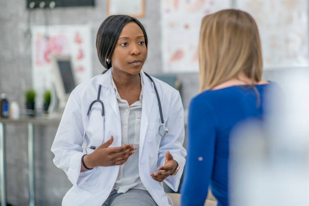 istock Doctor Comforting A Patient 898343428