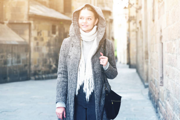 istock portrait of young female in hood 898346708