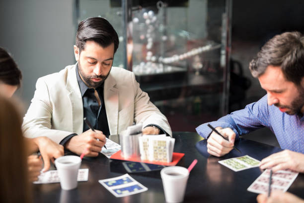 istock Friends playing bingo in a casino 898346964