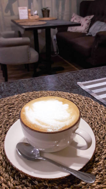 istock A cup of fresh cappuccino coffee in a cafe 898347704