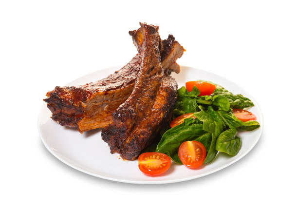 ribs grilled with salad on a white isolated background