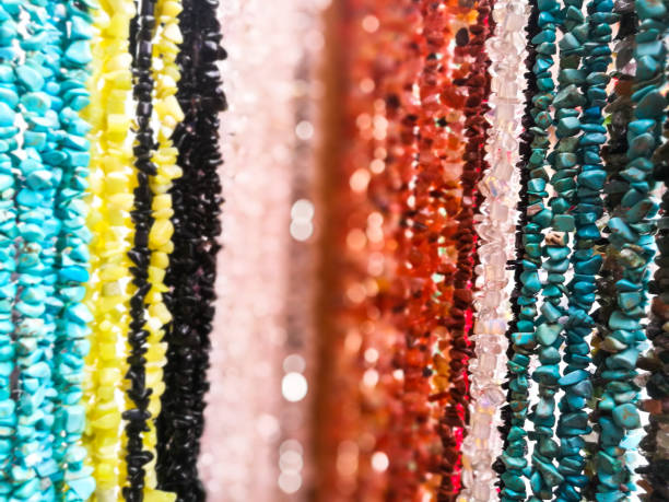 istock Close up of multi colored beads and necklaces macro background 898354904