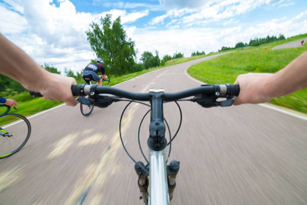 istock Rider driving bicycle on an asphalt road. 898355210