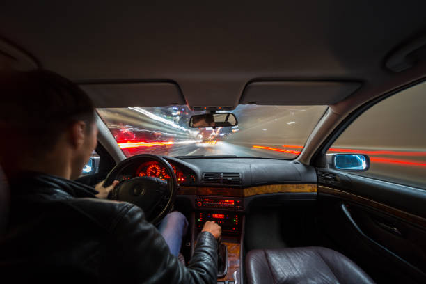 istock Night city road view from inside car 898355898