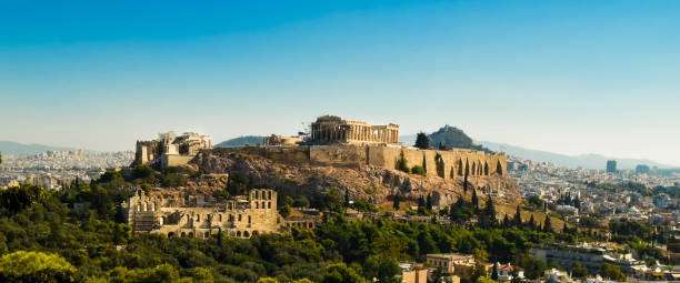 istock Parthenon acropolis among pine trees  Athens Greece 898357412