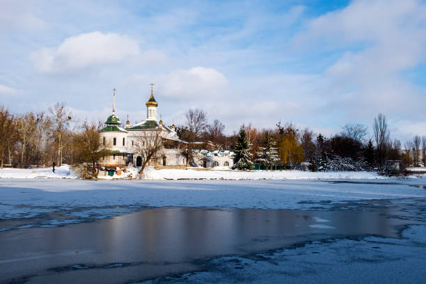 Temple of Blessed Xenia of Peterburg on the South Bug River in winter (Ukraine, Vinnitsa) Temple of Blessed Xenia of Peterburg on the South Bug River in winter (Ukraine, Vinnitsa) vinnytsia photos stock pictures, royalty-free photos & images