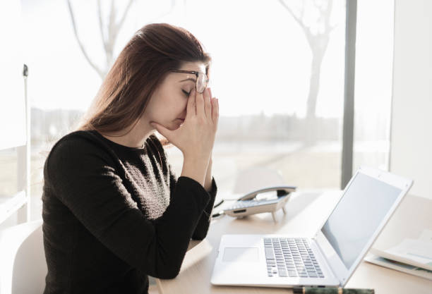 istock Stressed woman working in the office 898357608