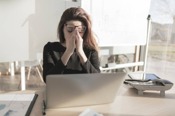 istock Stressed woman working in the office 898357622
