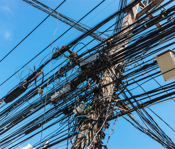 istock Intertwining of many electrical wires 898359702