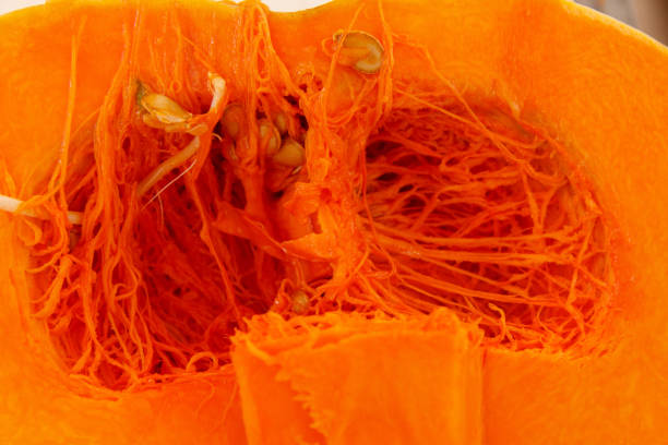 istock Opened pumpkin on a farmers market 898365334