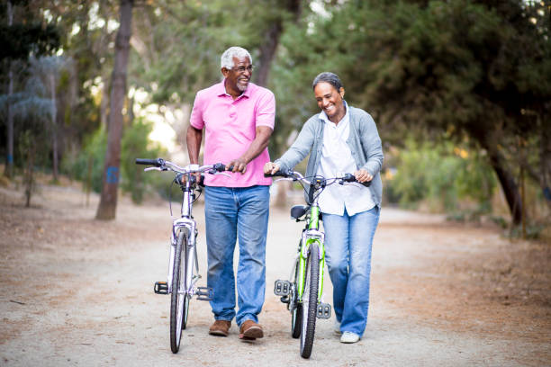 istock Senior African American Couple Riding Bikes 898372672