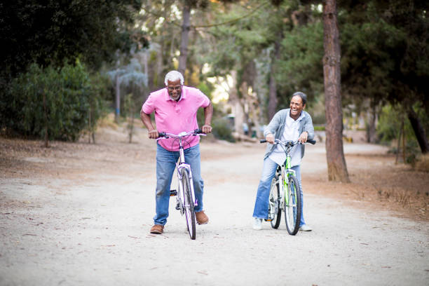 istock Senior African American Couple Riding Bikes 898372854