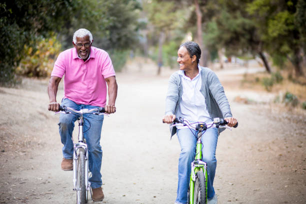 istock Senior African American Couple Riding Bikes 898373048