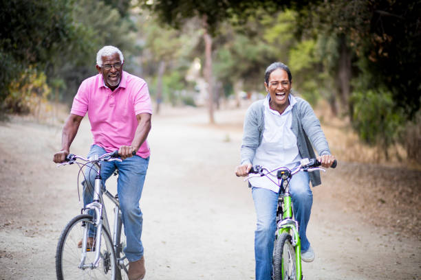 istock Senior African American Couple Riding Bikes 898373192