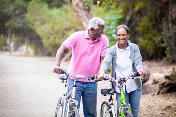 istock Senior African American Couple Riding Bikes 898373322