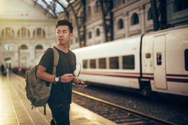 istock Tourist on train station 898374028