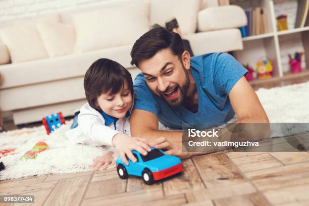 Father Has Fun With His Son An Exemplary Father And A Boy At Leisure Stock Photo - Download Image Now