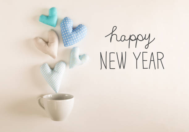 istock Happy New Year message with blue heart cushions 898380884