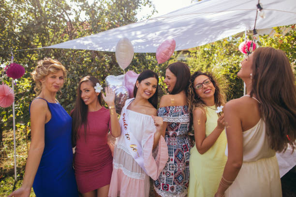 istock Bride to be and bride tribe at bachelorette party 898383468